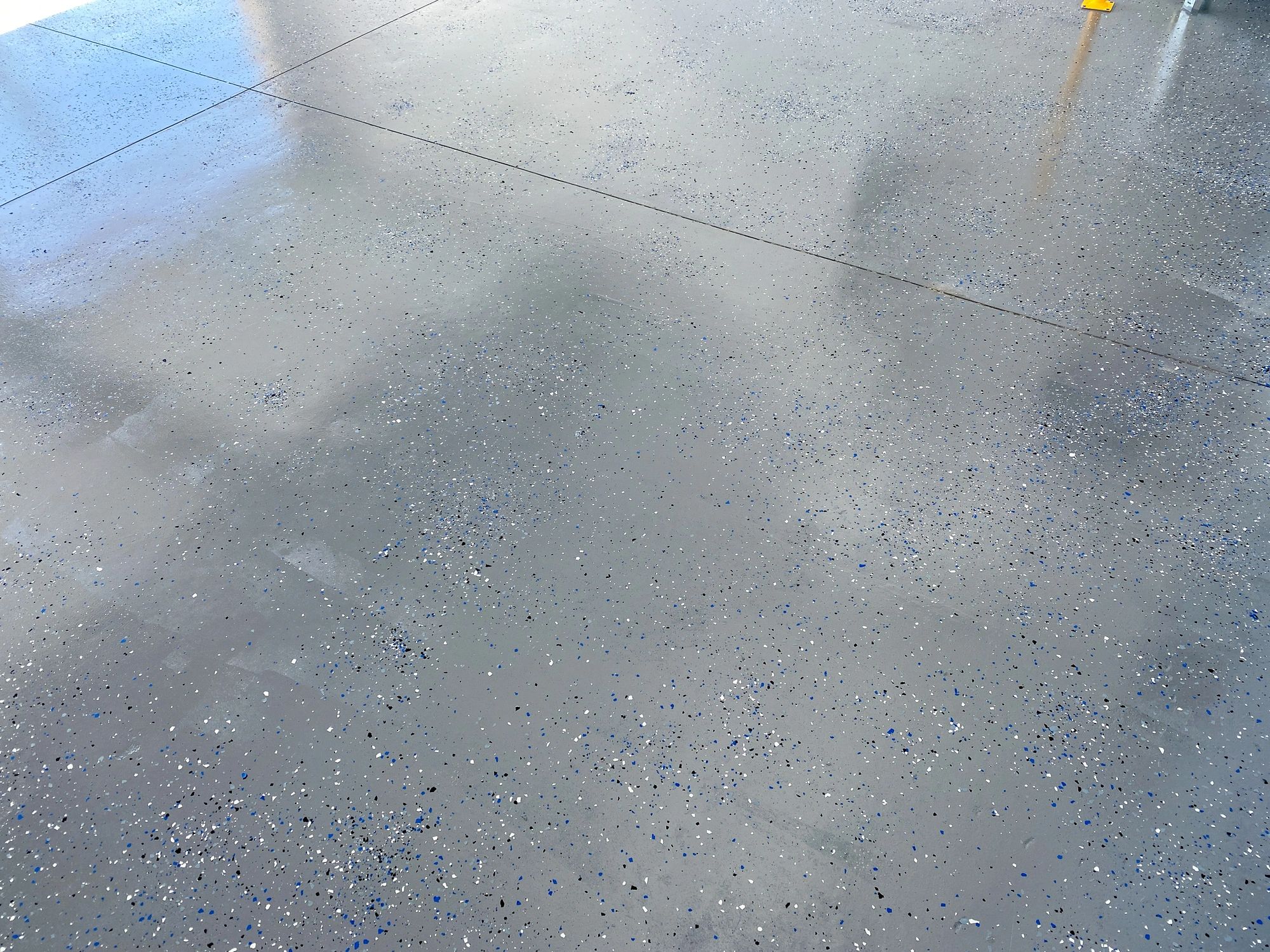 Close-up of a durable epoxy garage floor coating finish