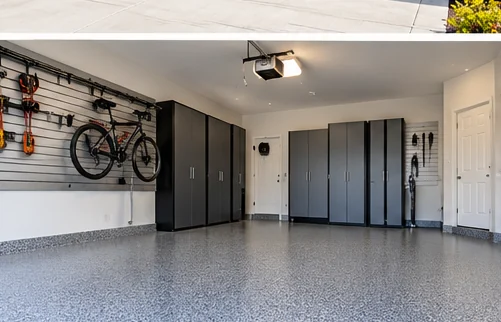 Organized residential garage with a finished floor